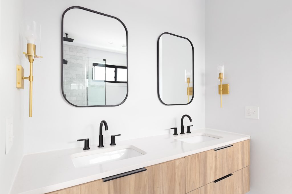 remodeled bathroom with double vanity