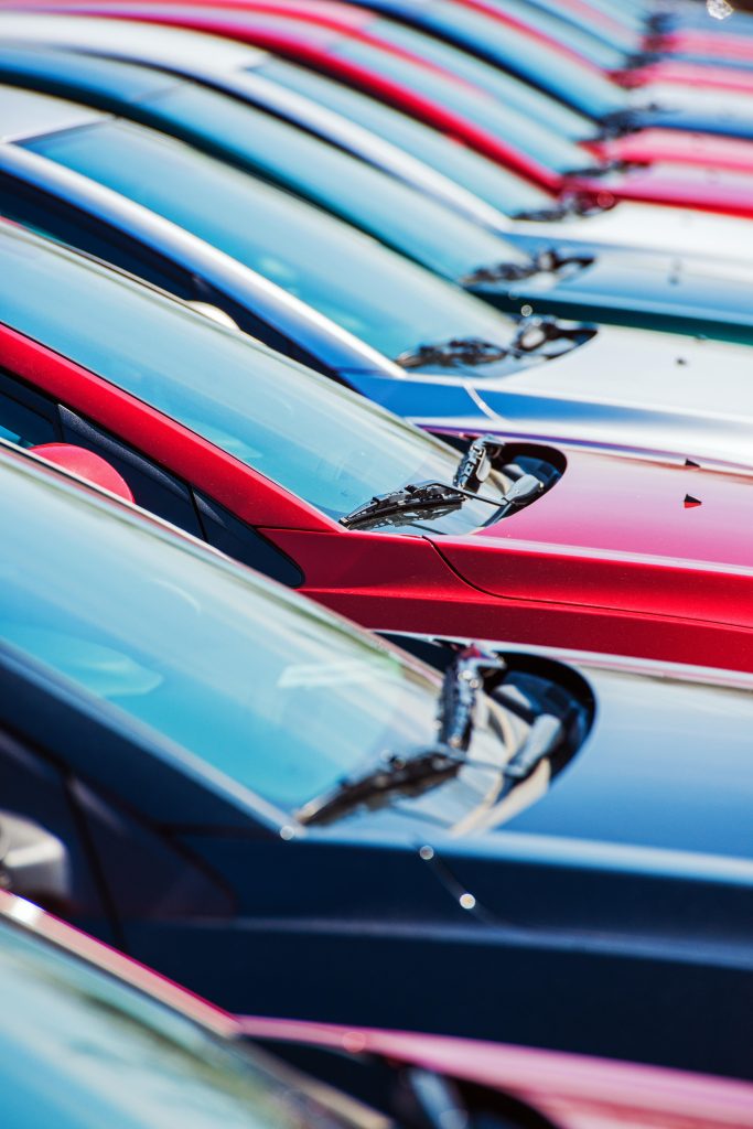 close up car dealership parking lot