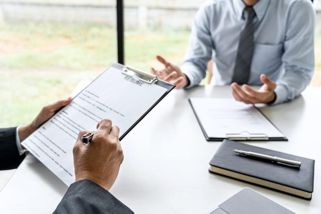 man and woman reviewing paperwork