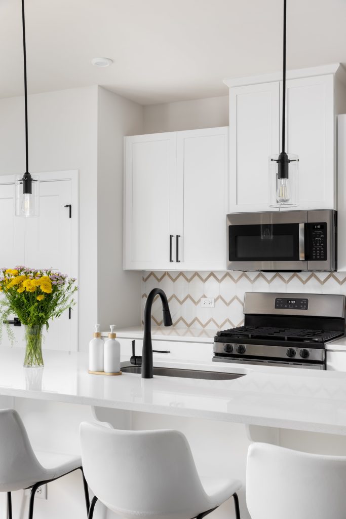 modern kitchen makeover with white countertops